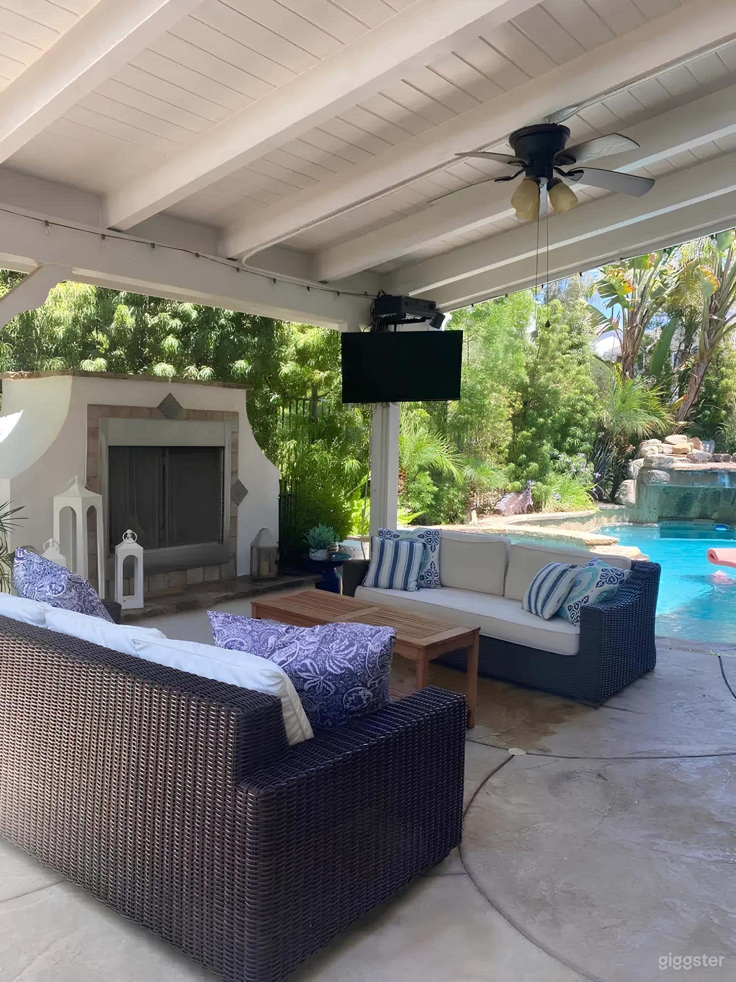 Tropical Backyard with Pool, Waterfall &amp; Outdoor Lounge Photo 1