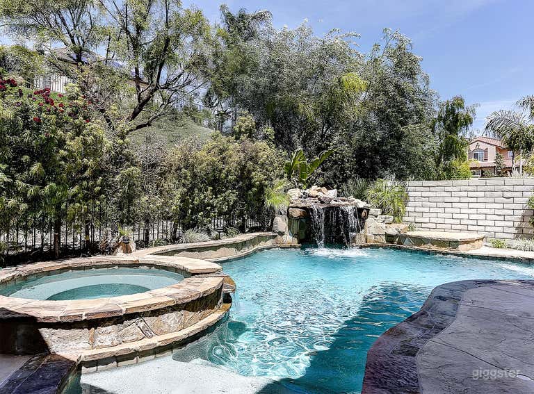  Tropical Backyard with Pool, Waterfall & Outdoor Lounge 