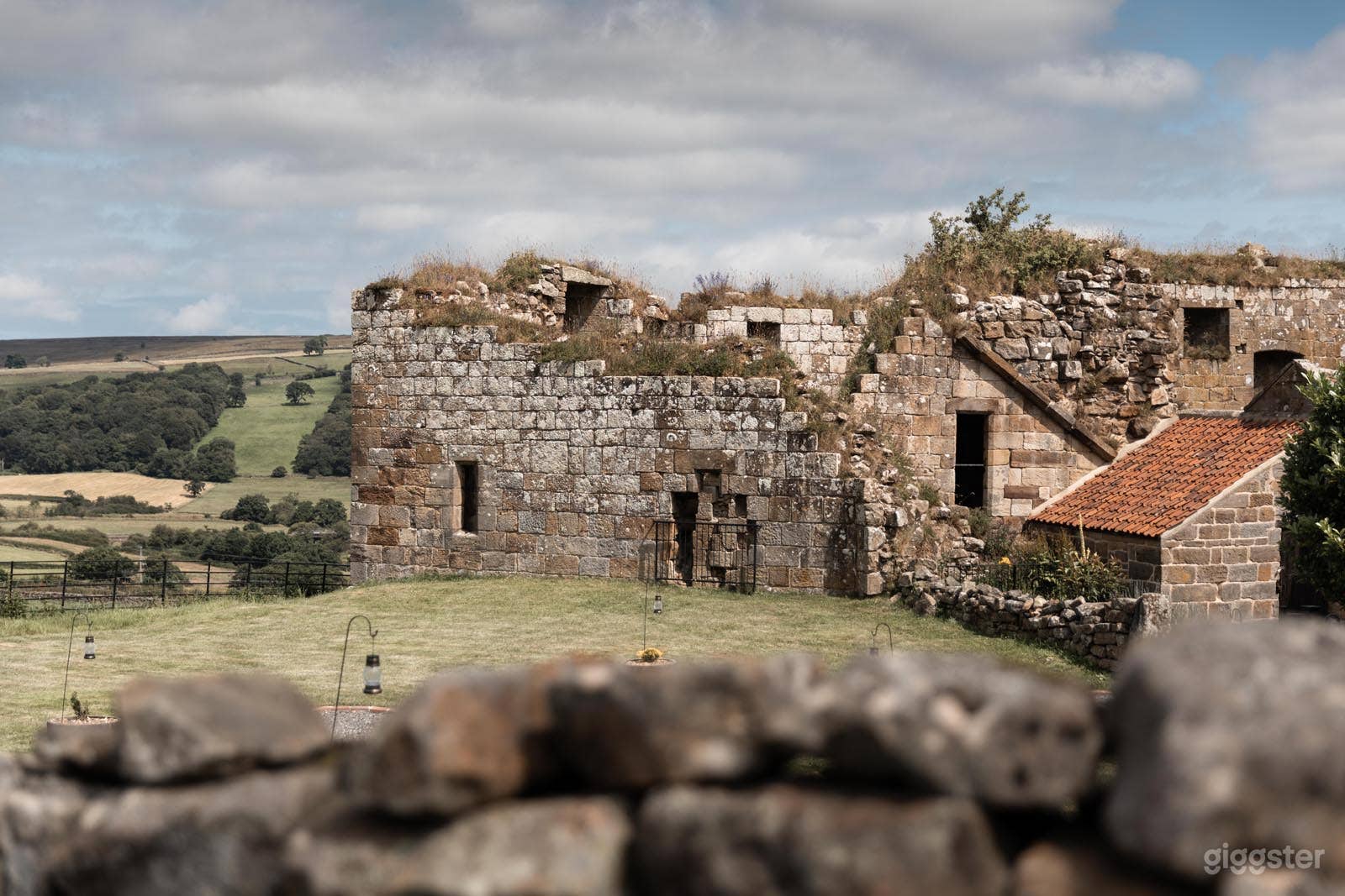 Rustic historical stone castle ruins and barn  Photo 3
