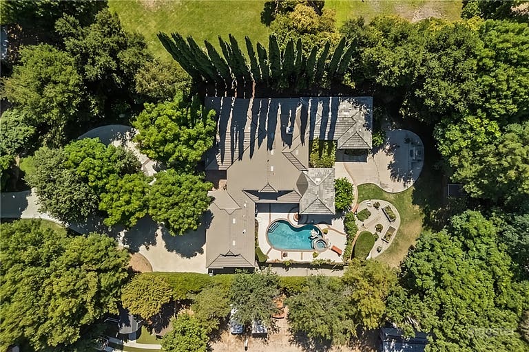  Unique 1 acre property with large front and back yards 