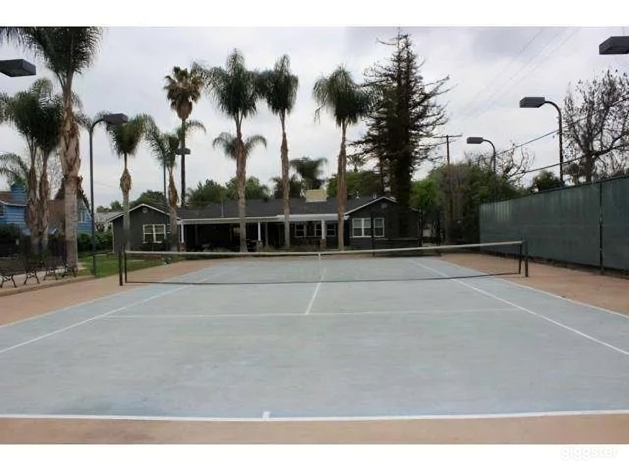 Lighted Tennis Court in Resort-style House Photo 1