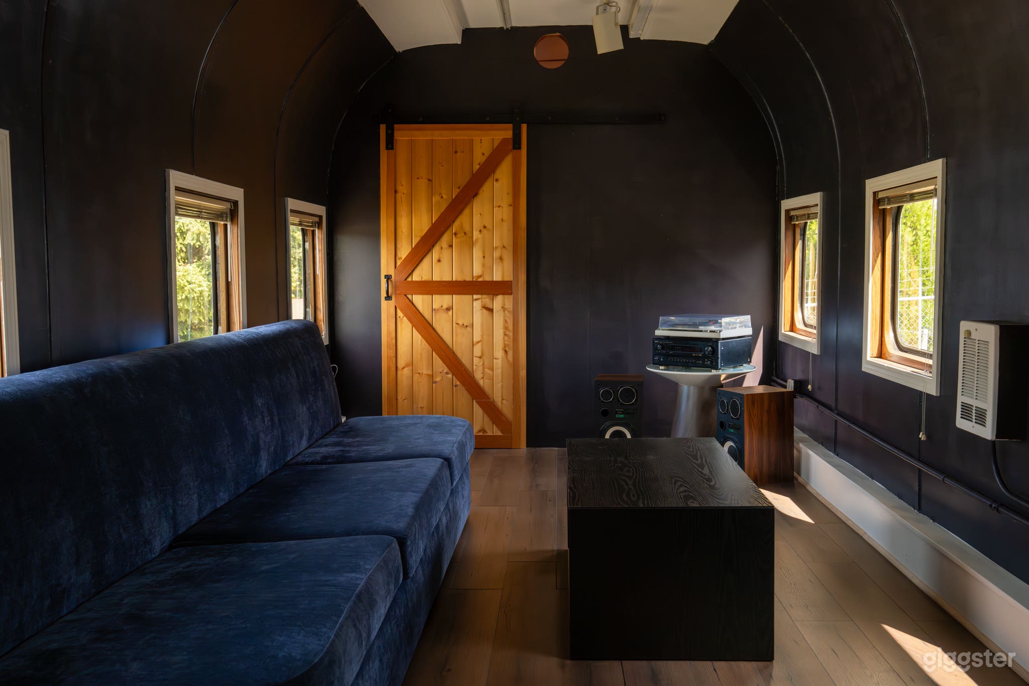 Renovated Vintage Luggage Train Car Lounge Photo 4