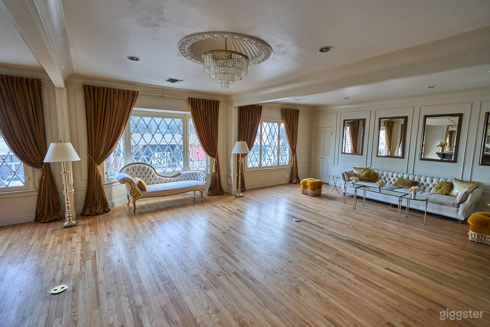 Main lounge facing the west wall with lounge seating.