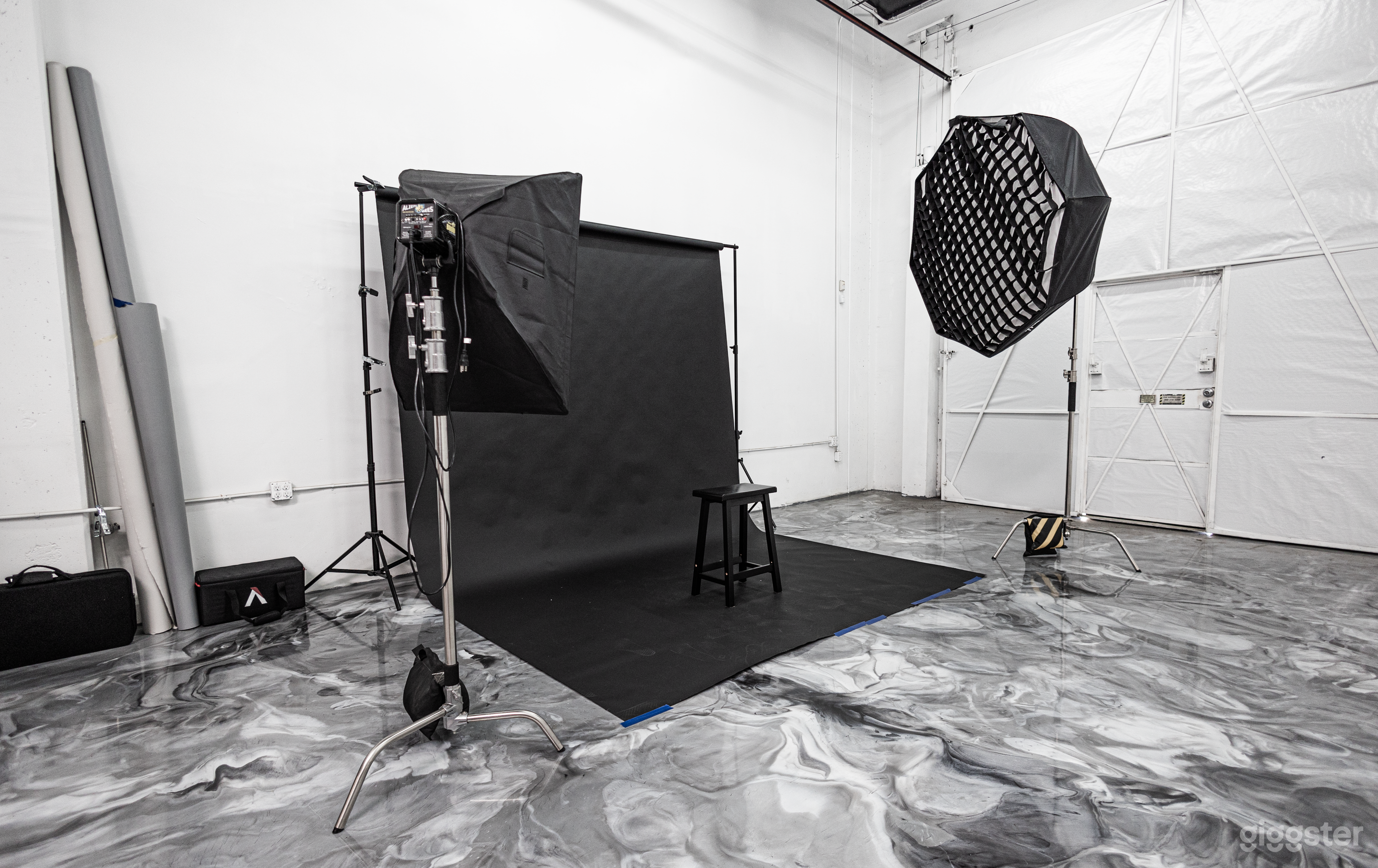 Floor setting with paper backdrop.