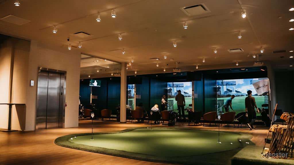 Modern Indoor Golf Simulator Facility Photo 1
