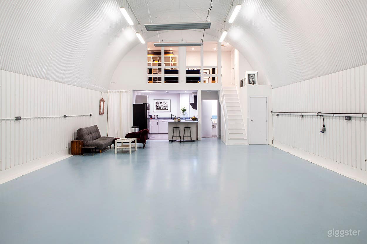 View of shooting space and mezzanine client lounge and office. 