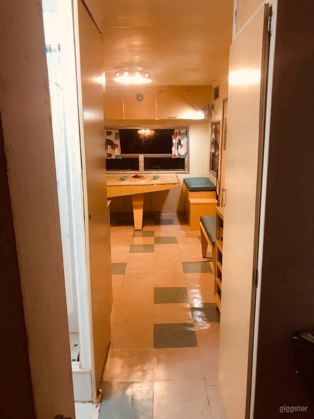 Interior from back (bedroom) to front kitchen area.