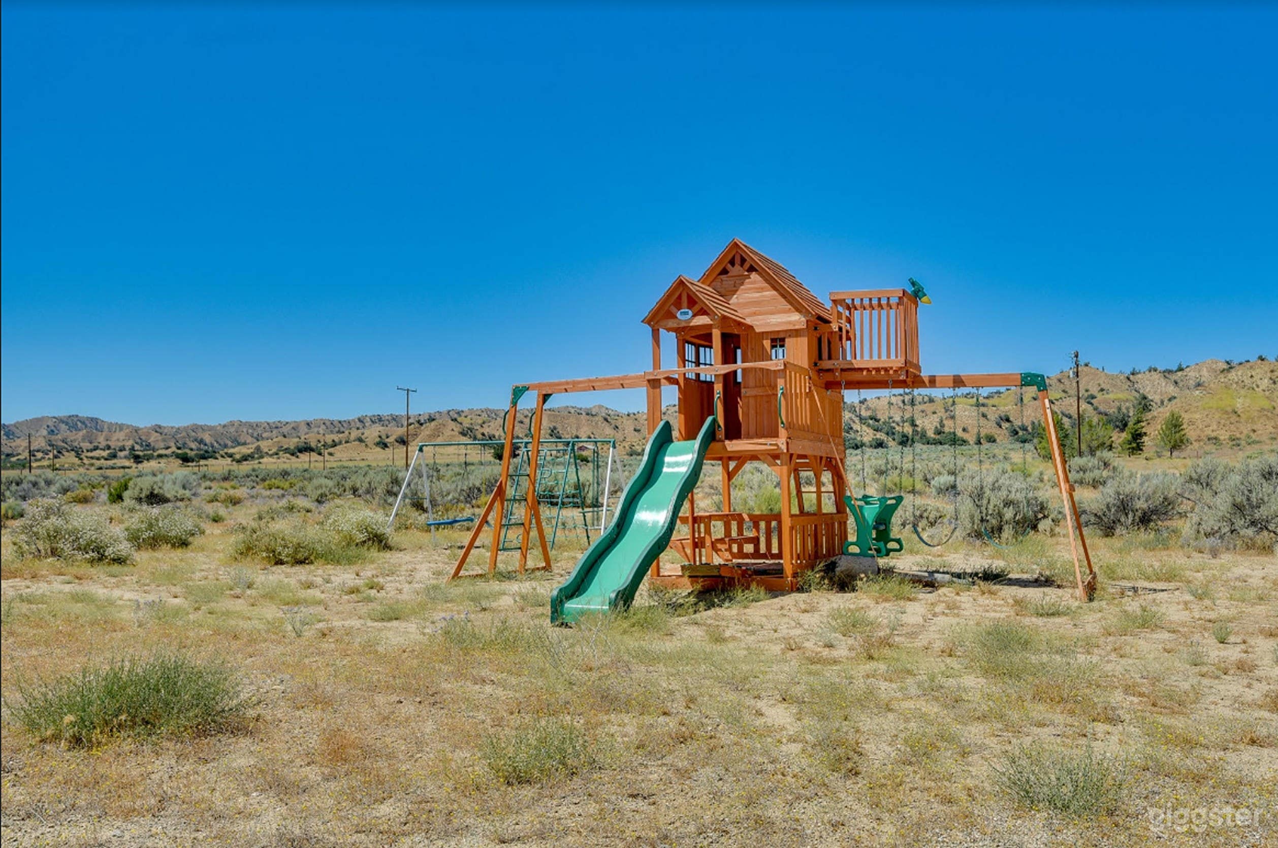 Family Fun Outdoor Area with Playground Photo 1