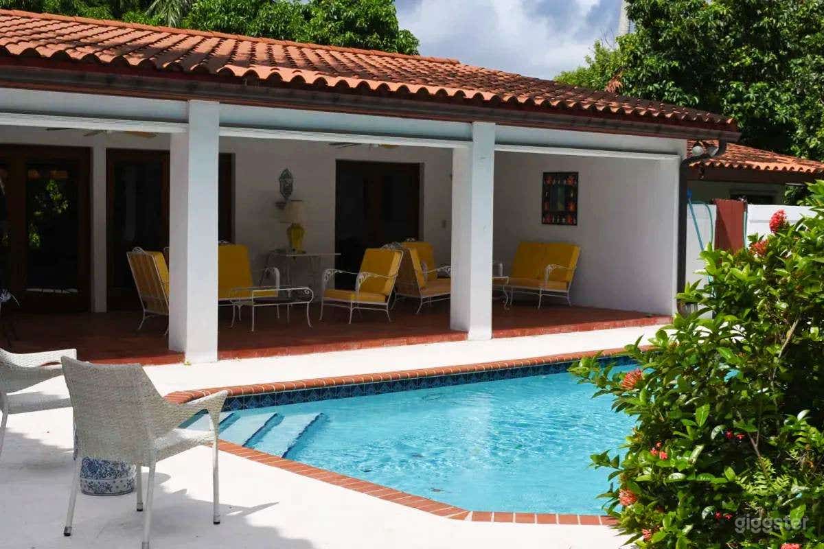 Secret garden with waterfall and light-filled home Photo 1