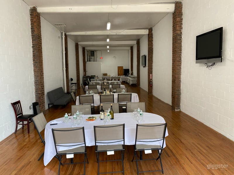 Raw multi-use space, exposed brick, high ceilings. Photo 1