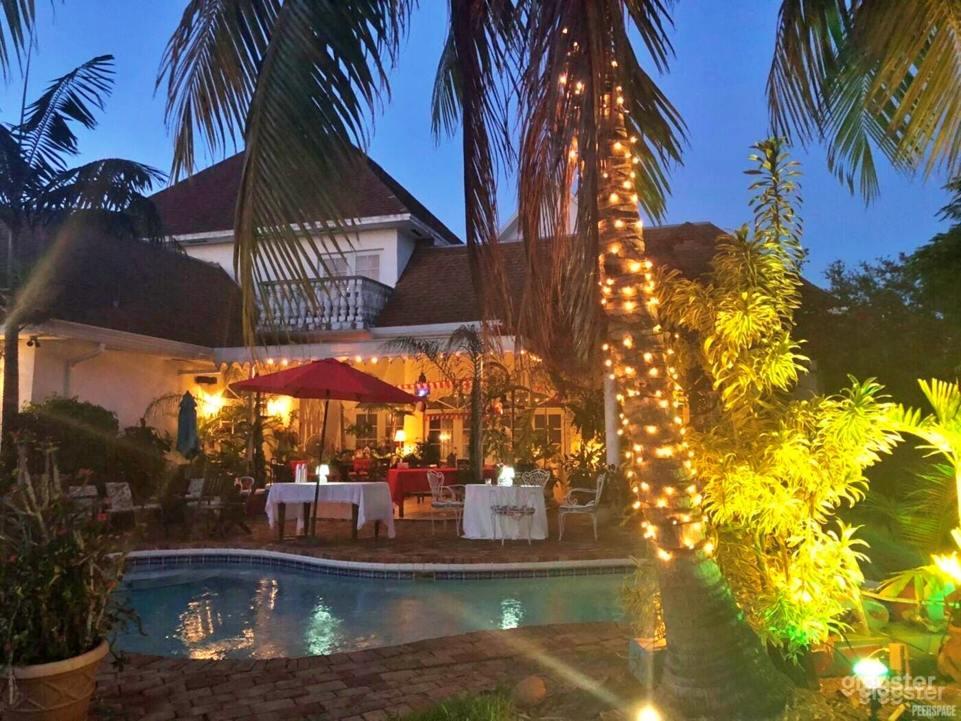  Tropical Poolside Oasis with Lush Garden Photo 1