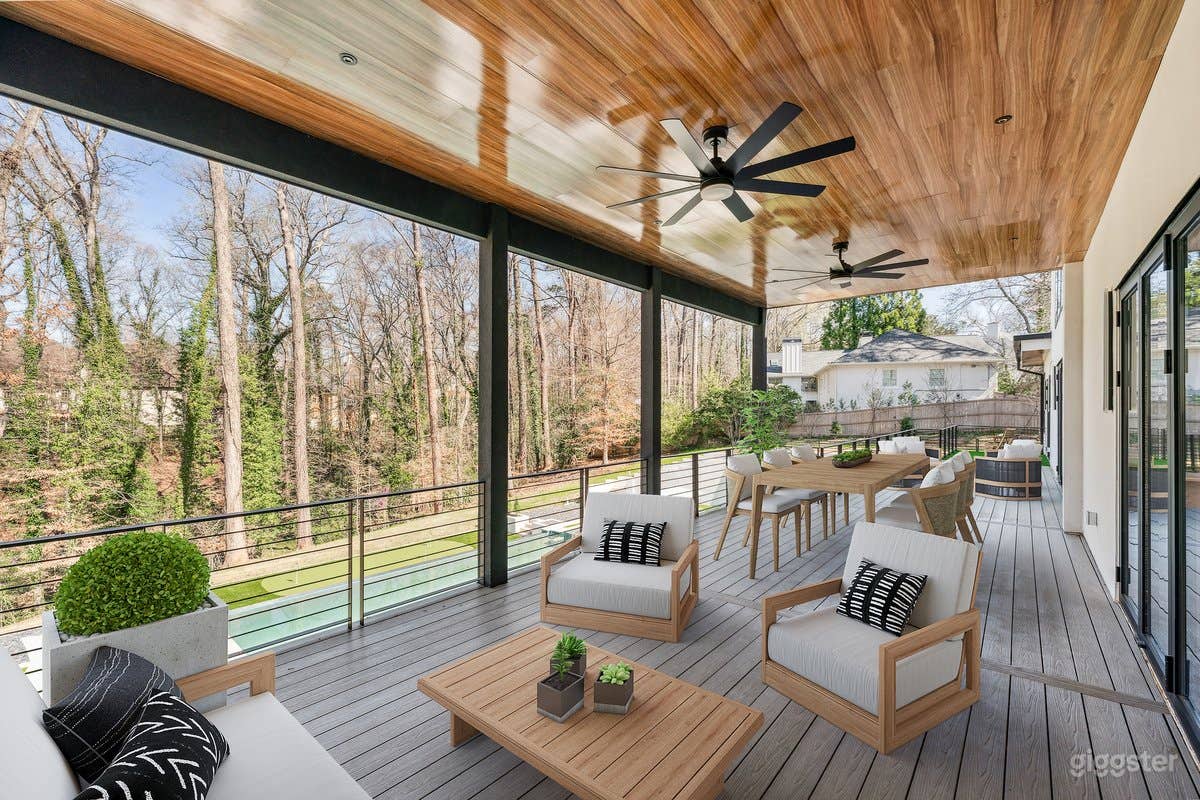 Main Level Deck with Pool View
This modern, minimalist deck overlooks the estate’s resort-style pool, offering a serene, elevated vantage point perfect for capturing luxury outdoor living. Ideal for poolside lounge scenes, elegant transitions.