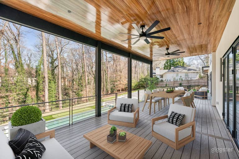  Main Level Deck with Pool View
This modern, minimalist deck overlooks the estate’s resort-style pool, offering a serene, elevated vantage point perfect for capturing luxury outdoor living. Ideal for poolside lounge scenes, elegant transitions. 