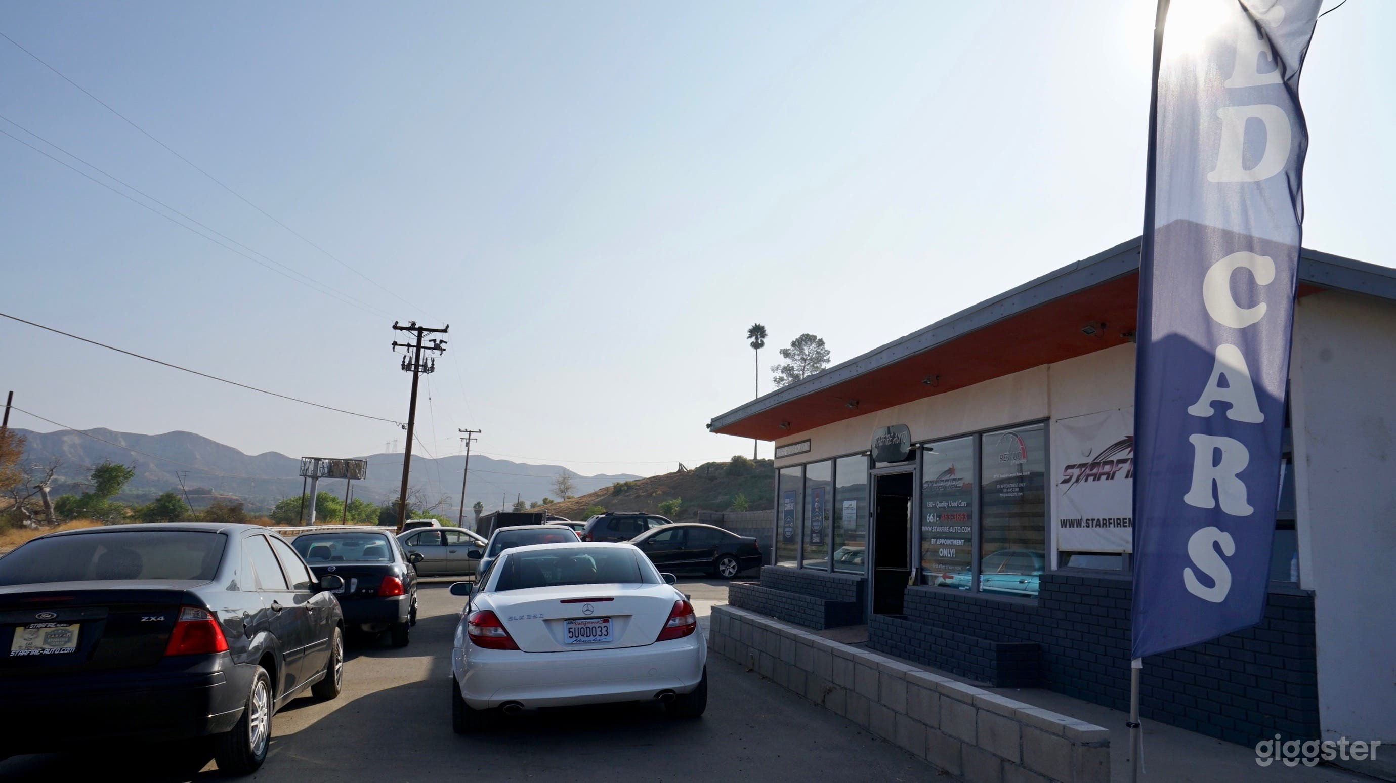 Rural used car dealership, antique store, on HWY! Photo 4