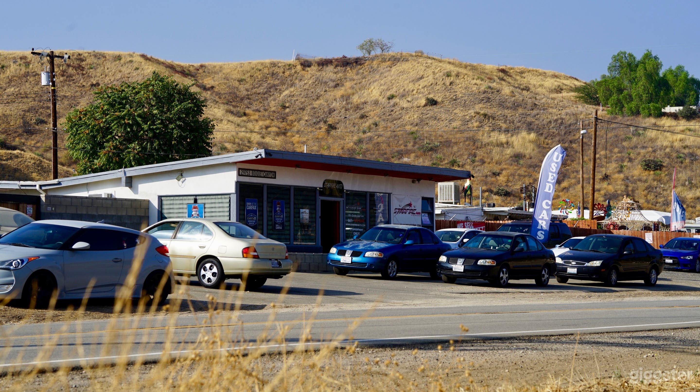 Rural used car dealership, antique store, on HWY! Photo 2