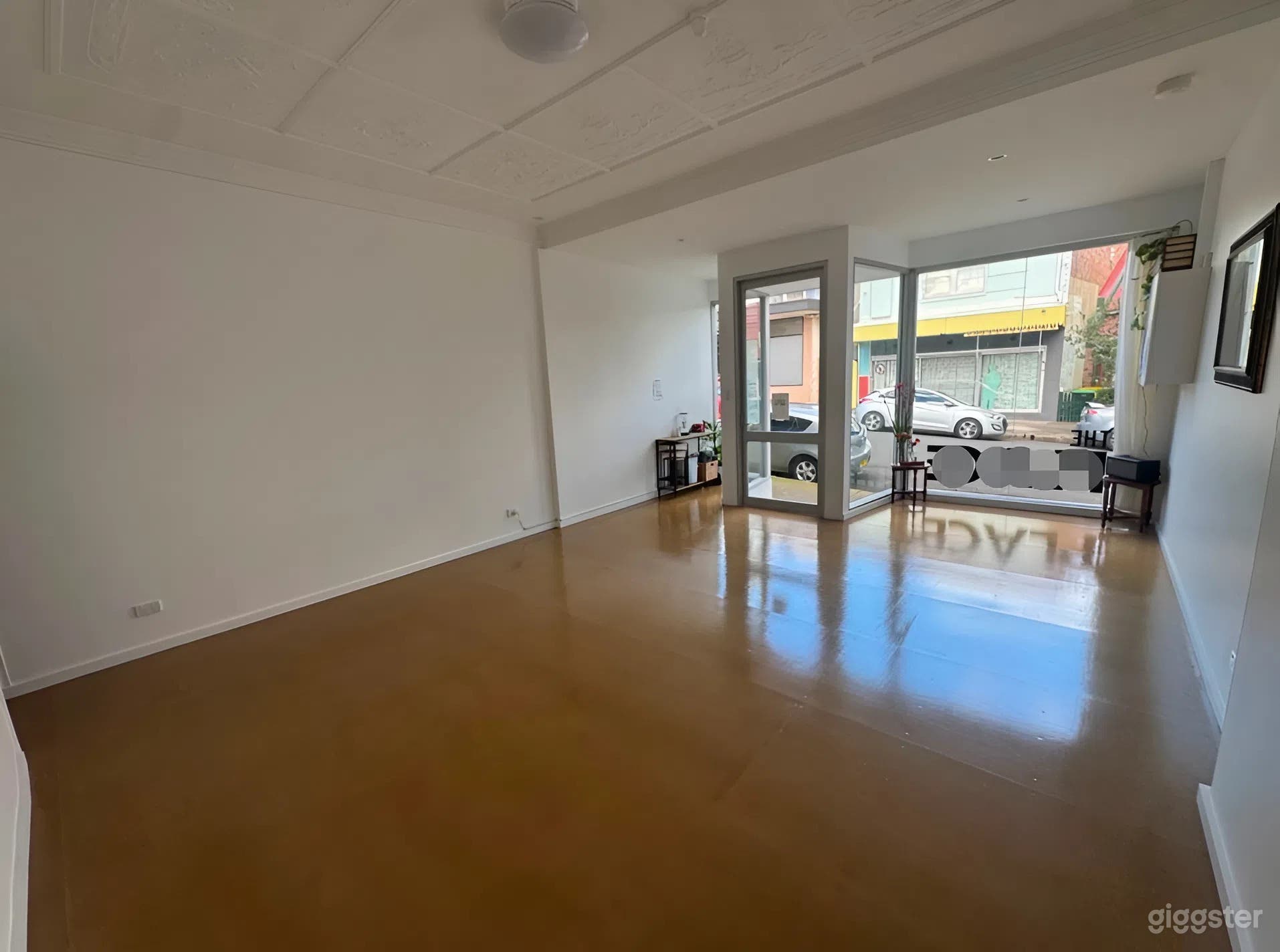 Natural Light Studio with Clear White Walls Photo 4