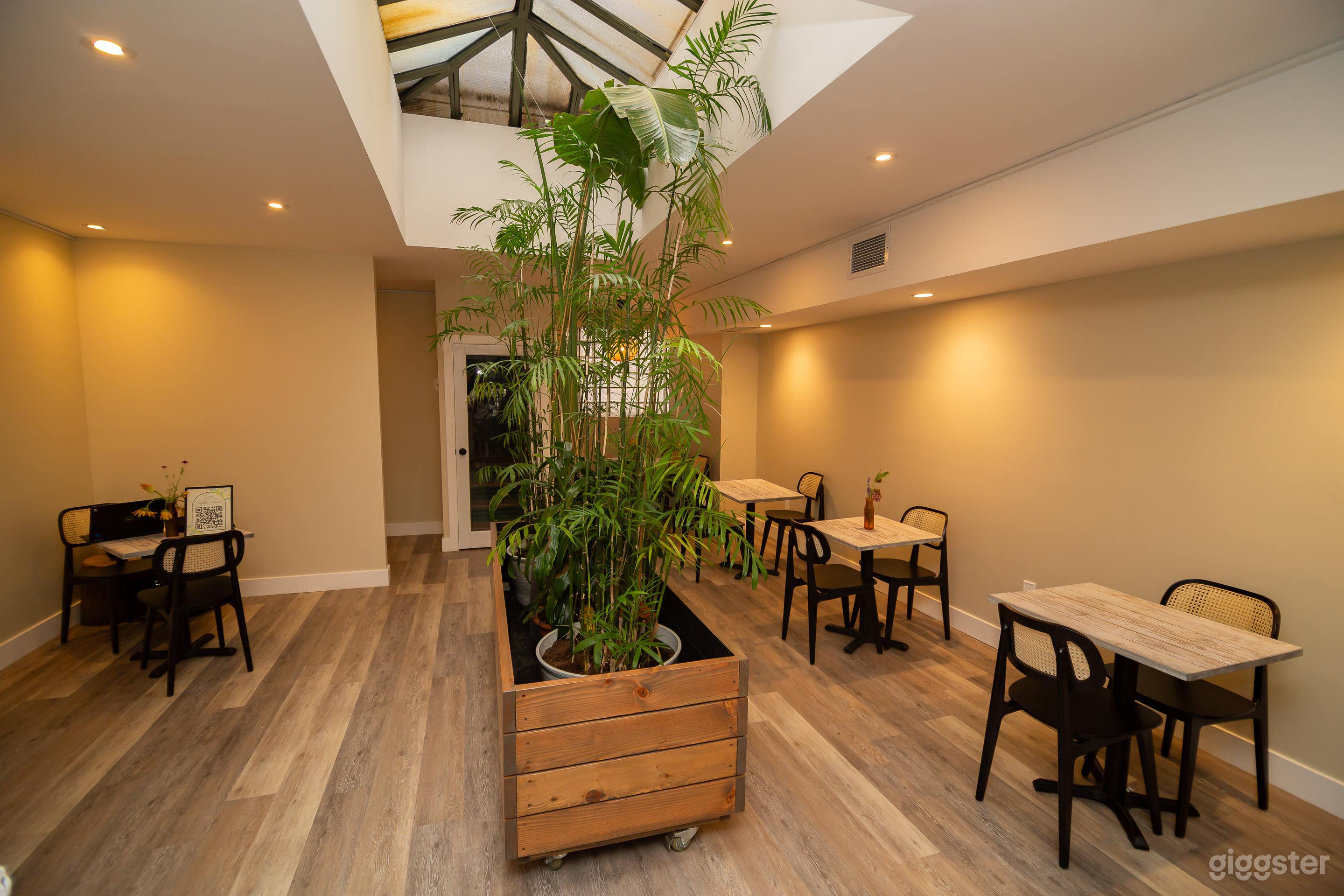 Sunlit Greenwich Village Event Space with Skylight & Wine Photo 2
