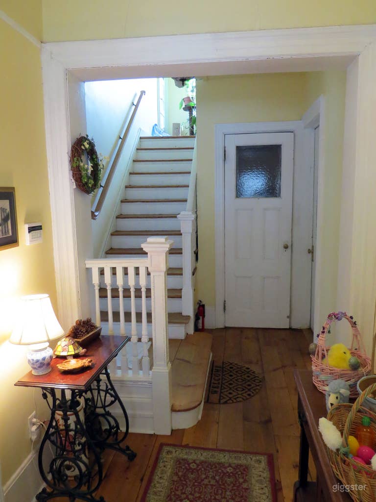  Ground floor entry hall, looking up stairs to second floor. 