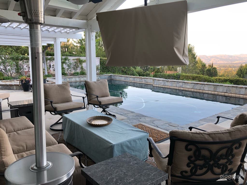 Stunning Poolside Retreat with Views Photo 1