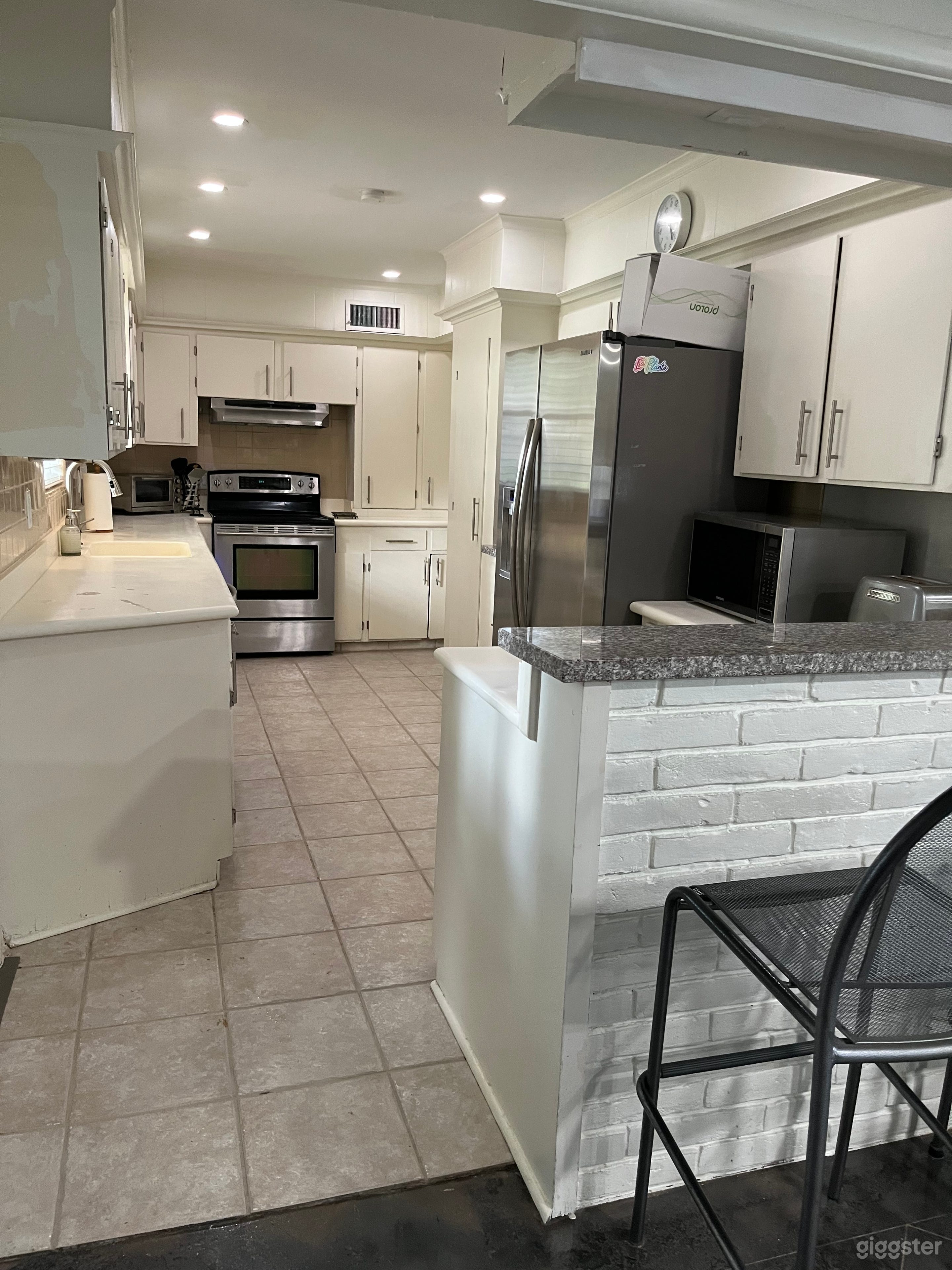 Open plan kitchen with breakfast / cocktail bar area