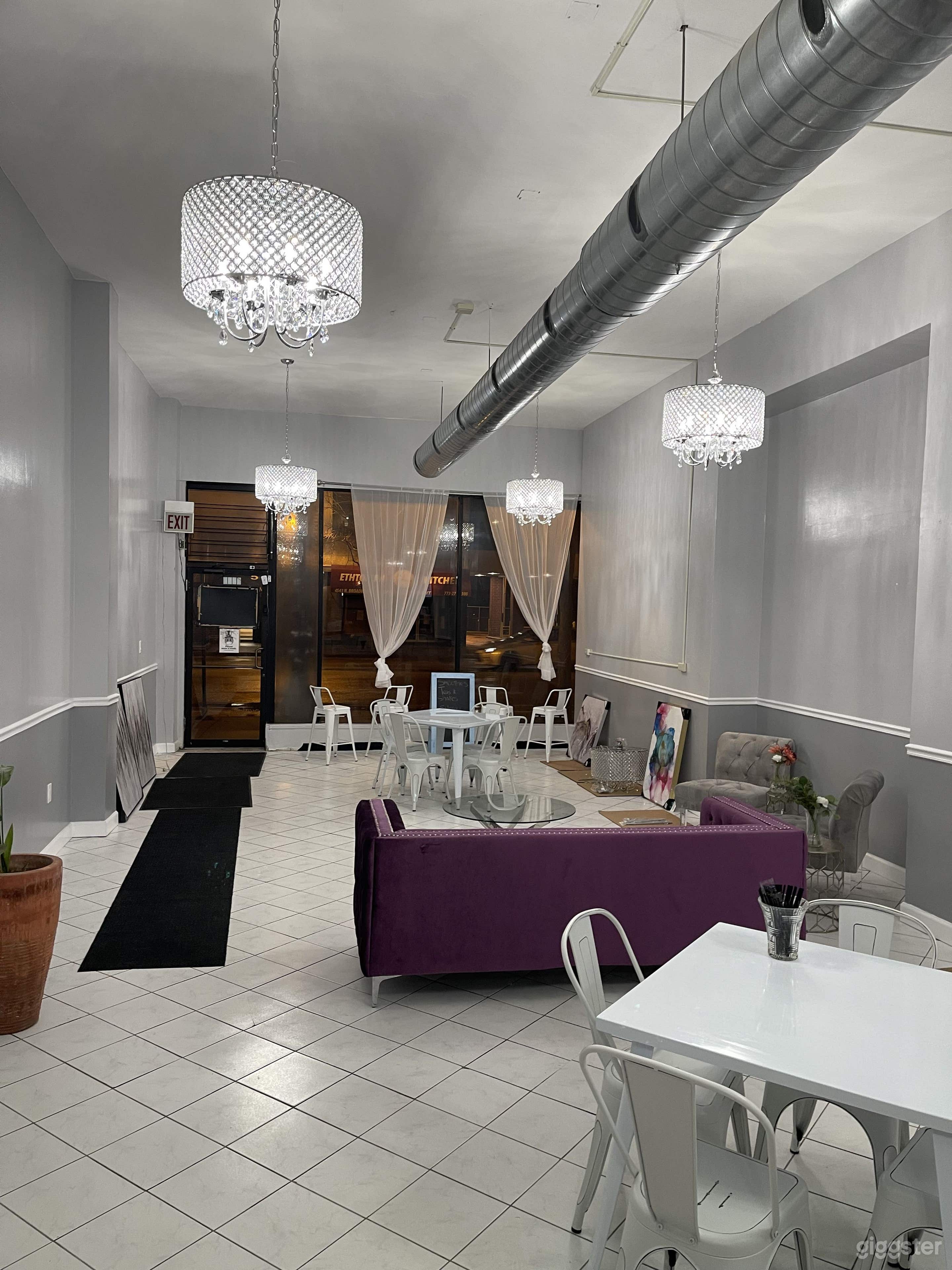 This is a night view from the bar area with the chandeliers.