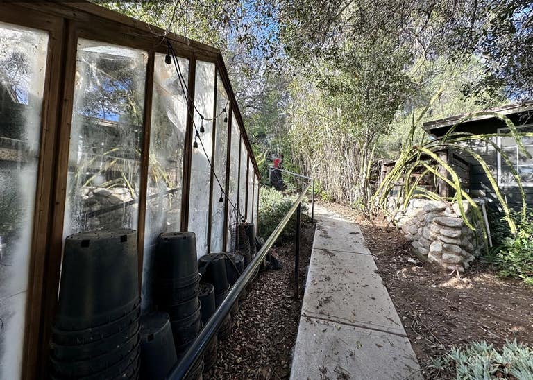  Hillside Ranch House turfed large lawn 