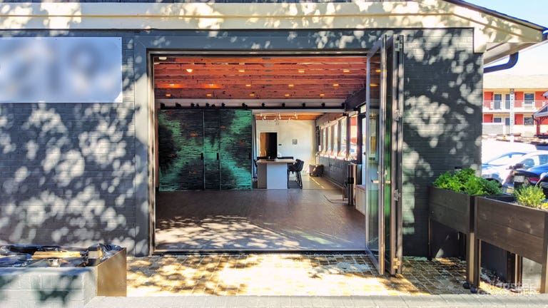  There is a patio in front of the building that you are welcome to use.  This view is from the street looking into the studio. 