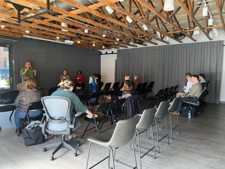  This view shows the studio with seated rows for a speaker event.  In the back of this picture, you can see the curtain covering the sliding mirrors. 
