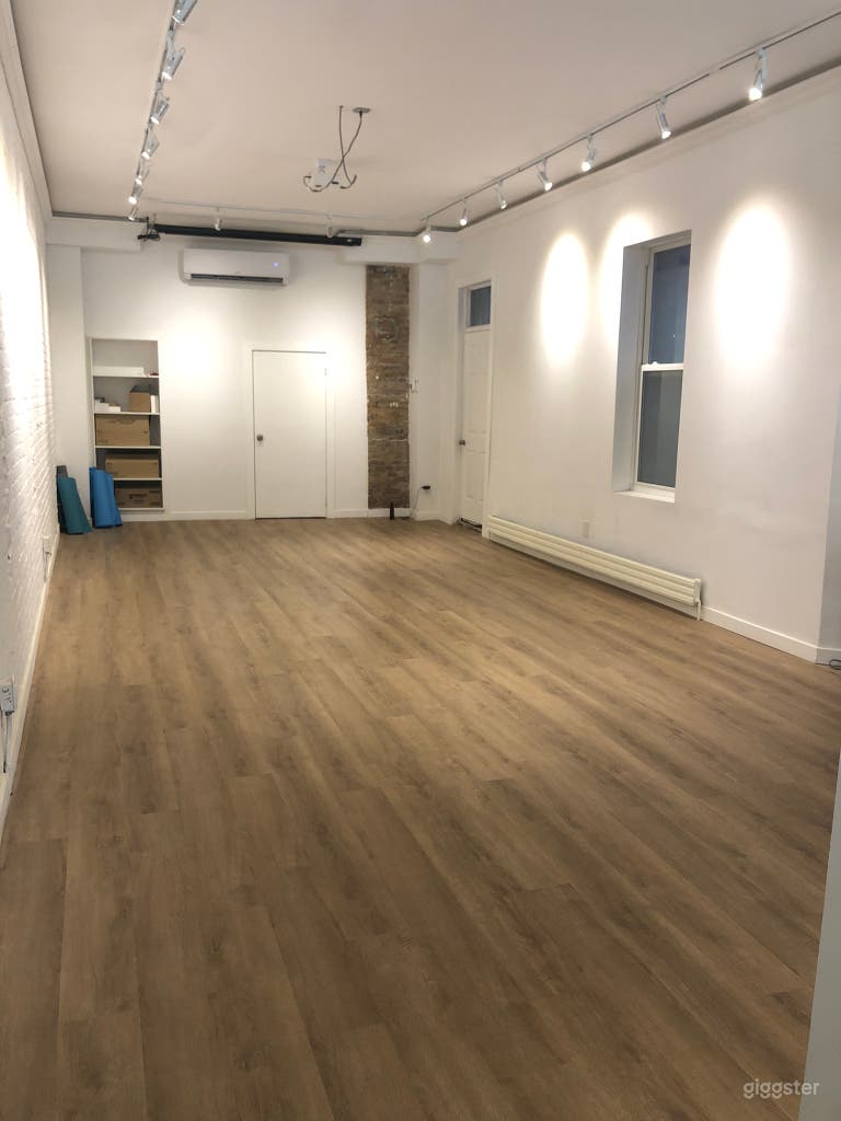  studio space, art gallery lighting, exposed brick walls 