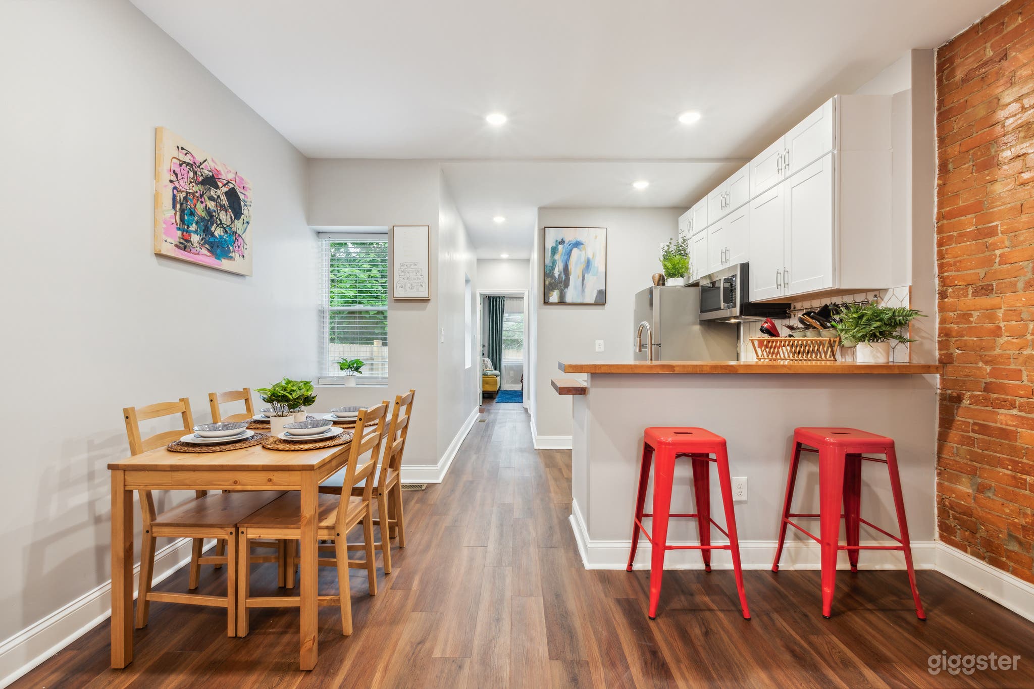 Historic Philly Row Home: Exposed Brick, Natural Light & Mod Photo 1