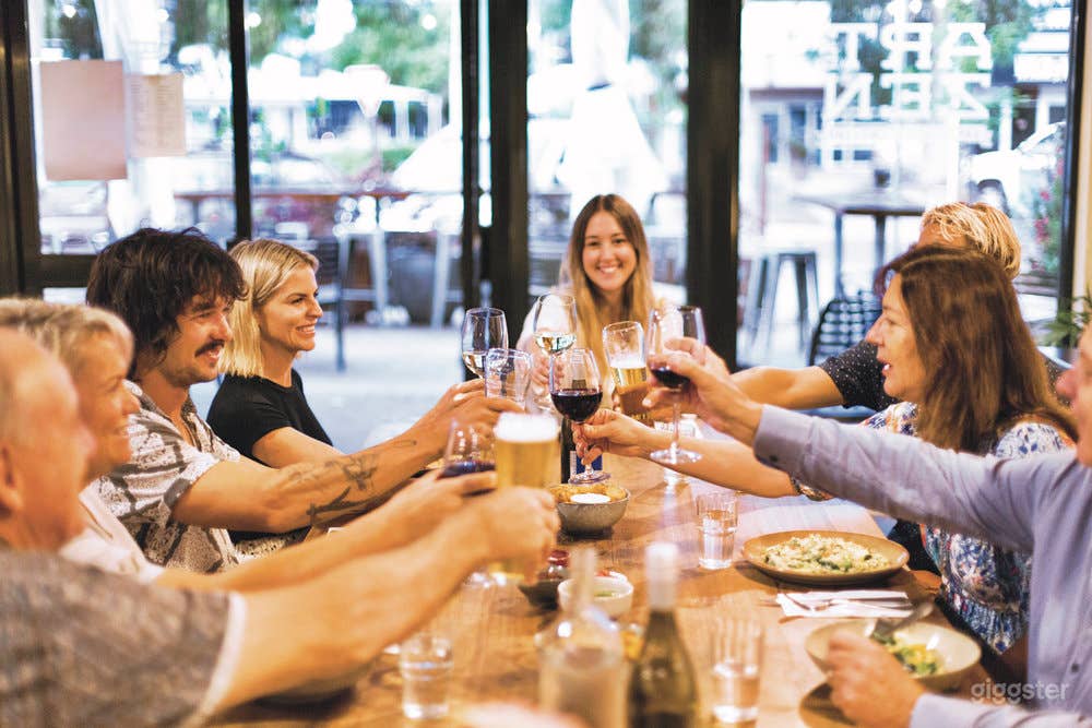 Evening meal in front window looking outside to al fresco.