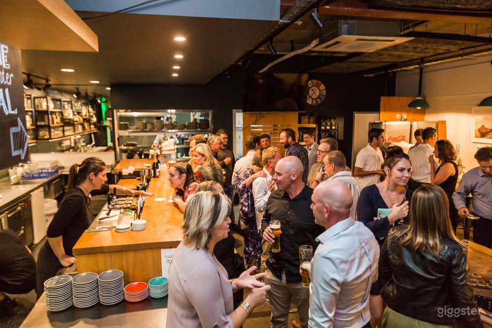 Back half of room during a function. Looking towards kitchen.