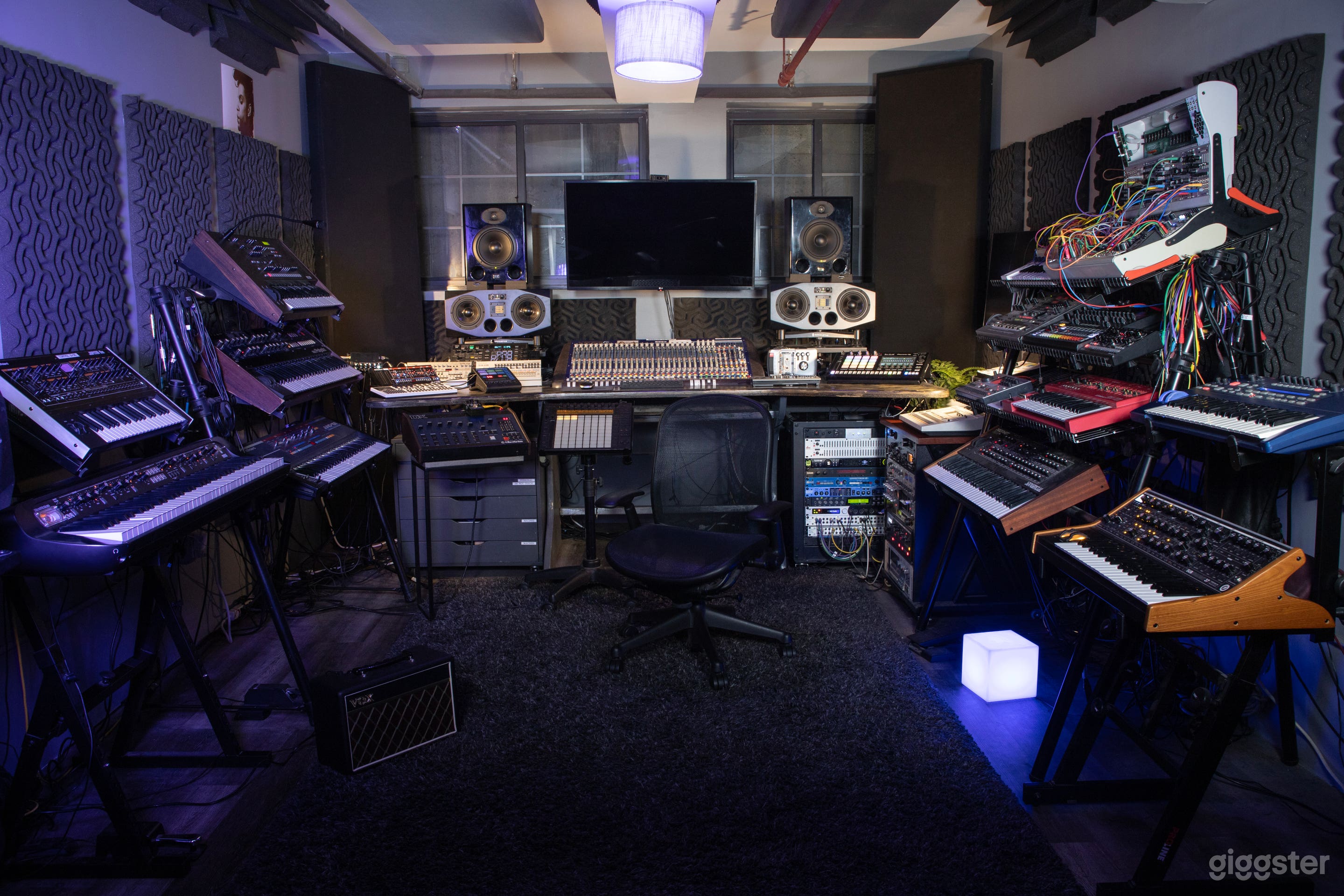 The mixing and production area features state-of-the-art monitoring speakers and a 32-channel Midas Mixer along with a collection of new and vintage analog and digital drum machines and synthesizers.