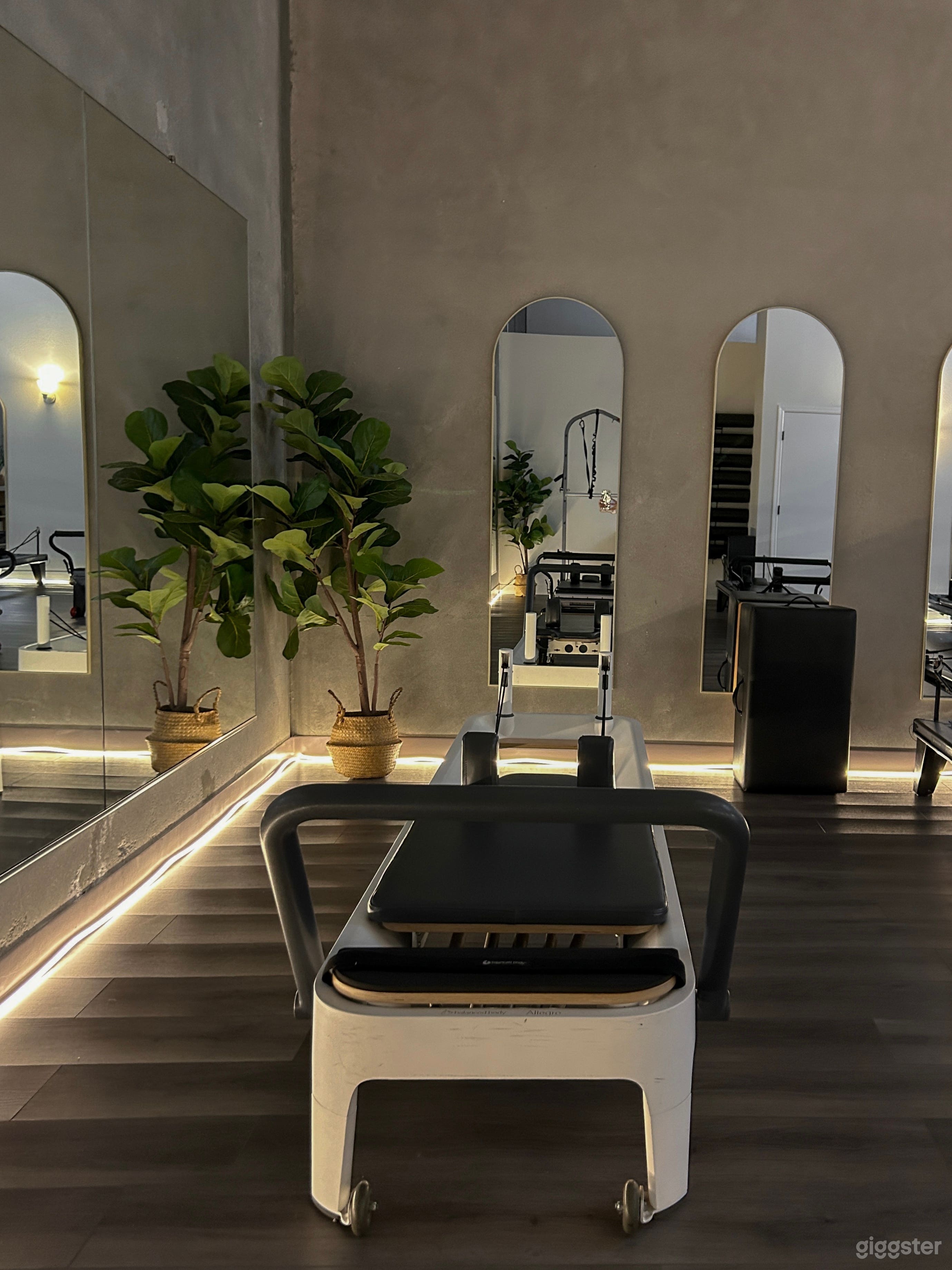 Reformer accessories accompany each station. 