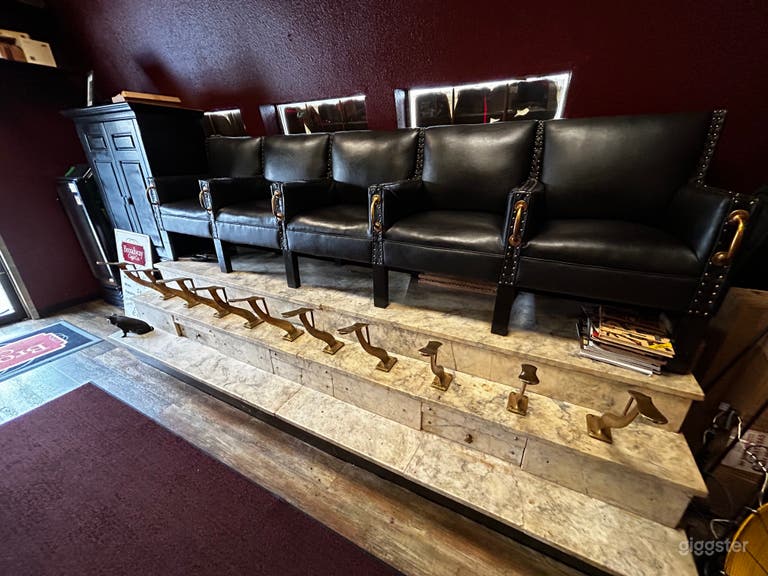  100 yr old marble shoe shine, 5 black studded leather seats with brass foot stands for shoes/sitting 