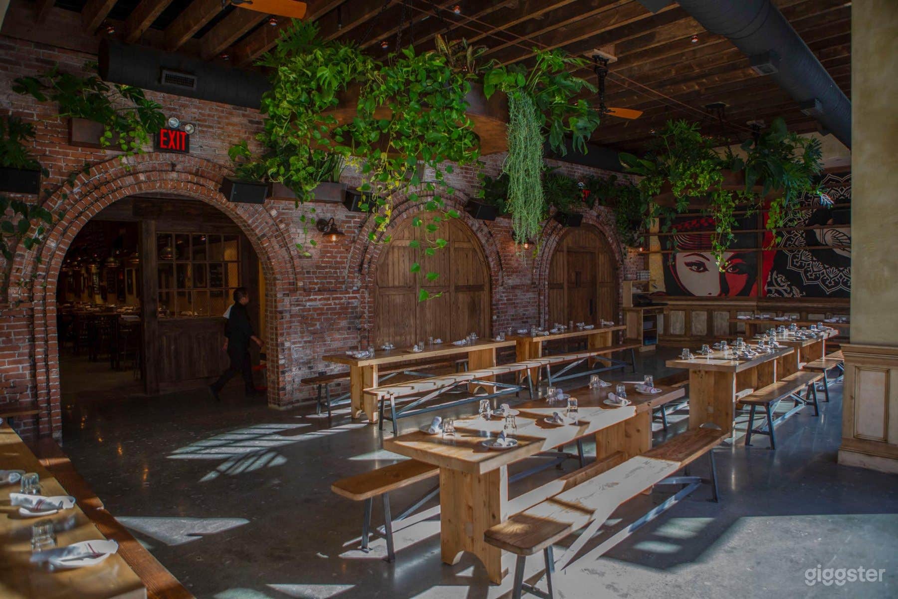 Beer Garden Room with hanger windows and exposed brick
