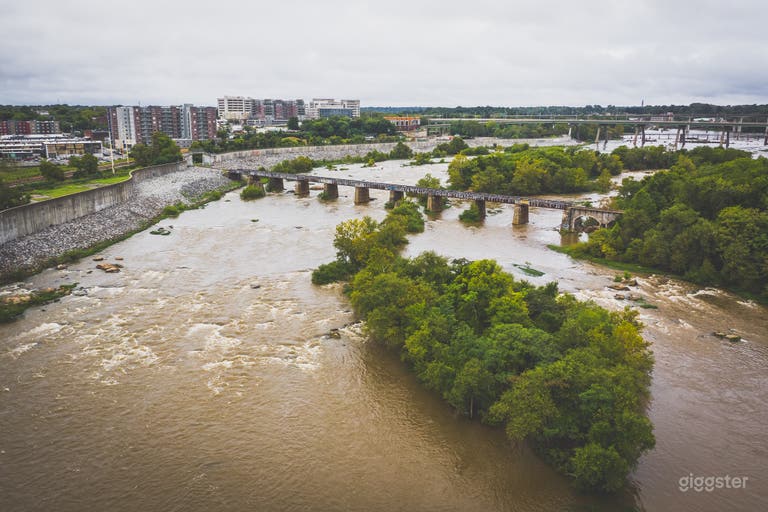  Drone shot of Sharp&#x27;s Island (in the foreground). The floodwall and the Manchester neighborhoods are to the left. Downtwon is to the right. 