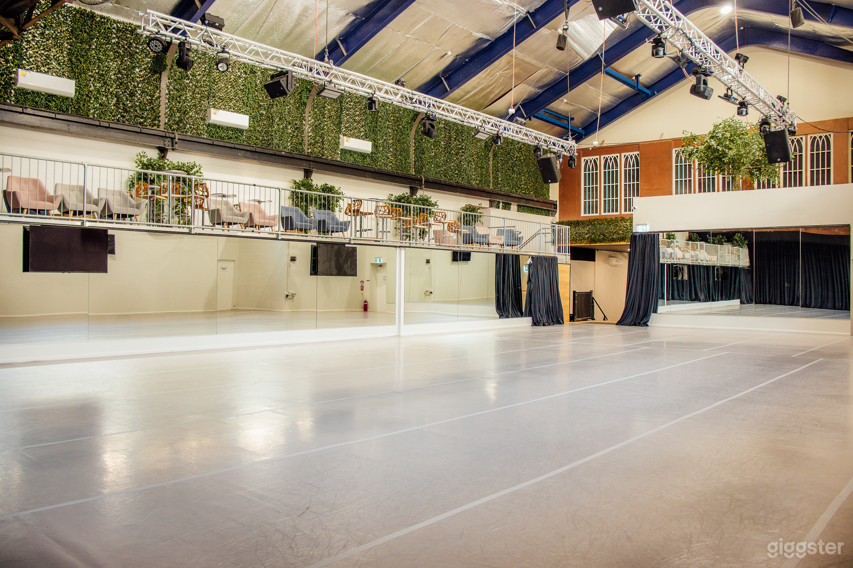 The Gantry - Black drapes open for mirrors