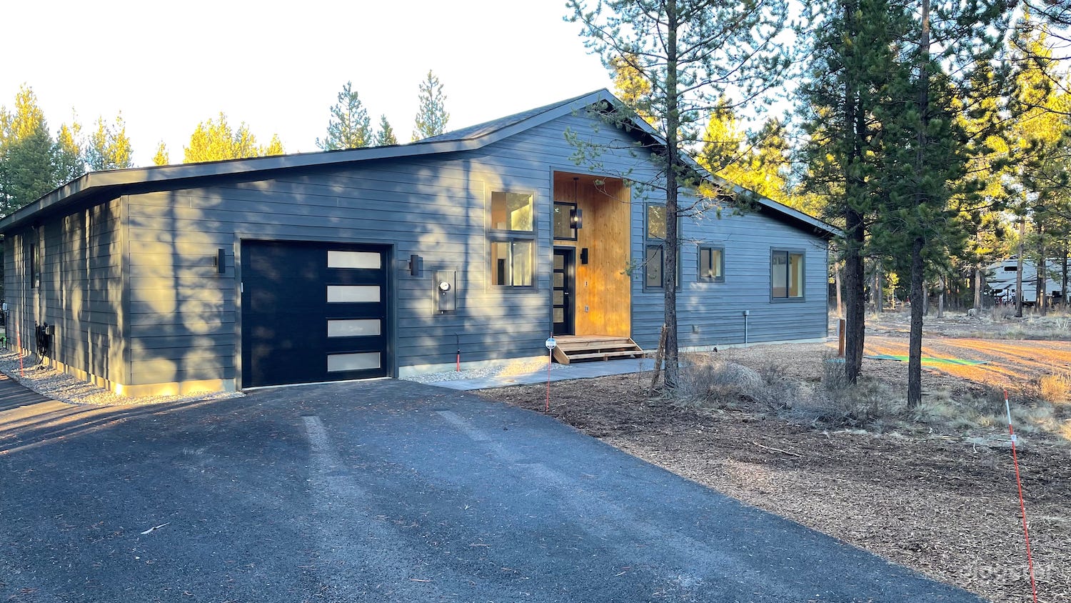 New Bend Modern Chalet Nestled on Wooded Lot Photo 2