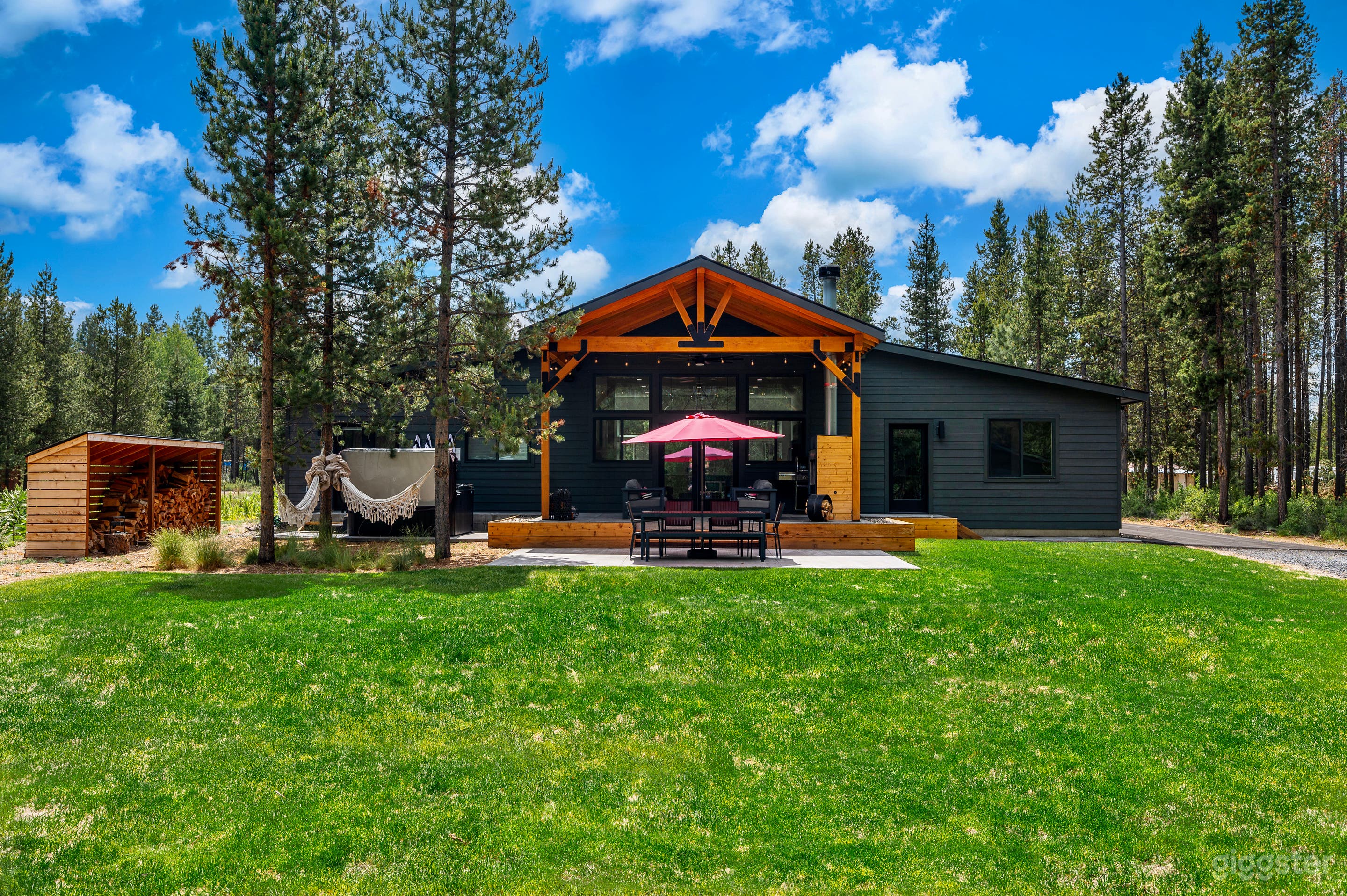 New Bend Modern Chalet Nestled on Wooded Lot Photo 1