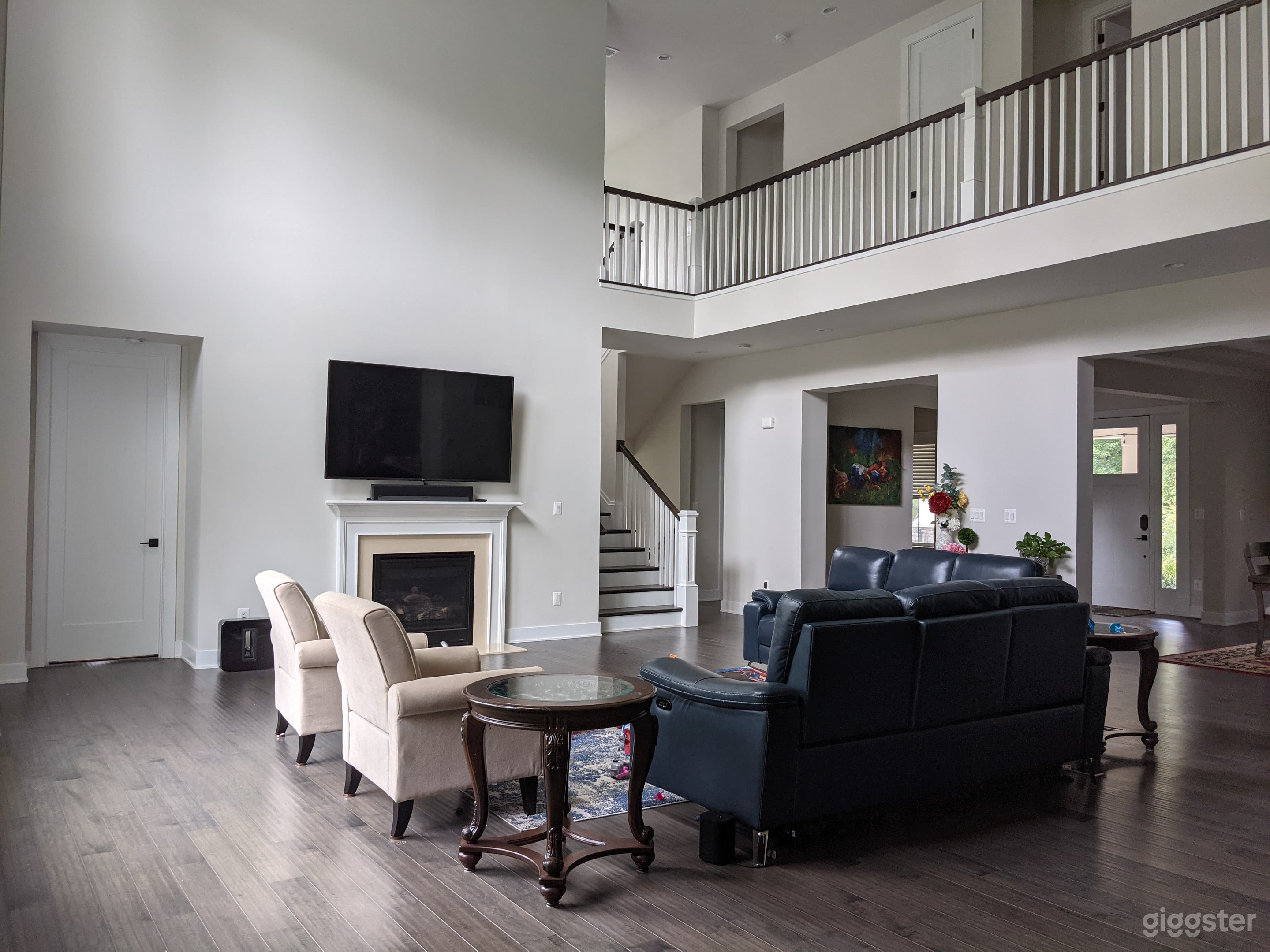 2 Story Family room with picture windows, 20 Feet High Ceiling
