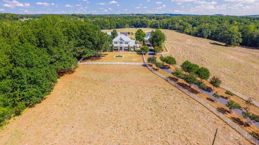 Secluded Victorian Home on 60 Acres by the River  Photo 1