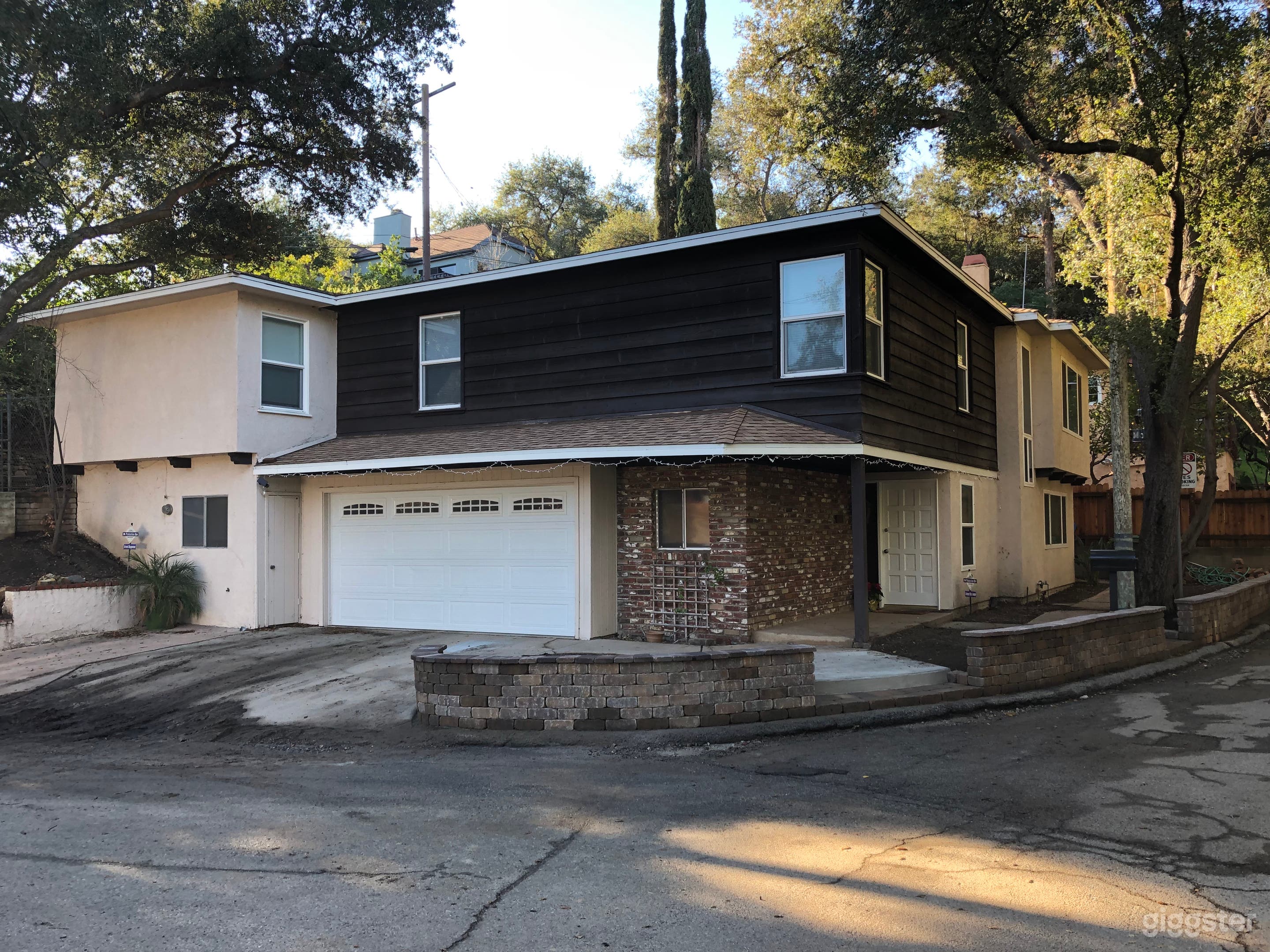 Quiet, woodsy street. 