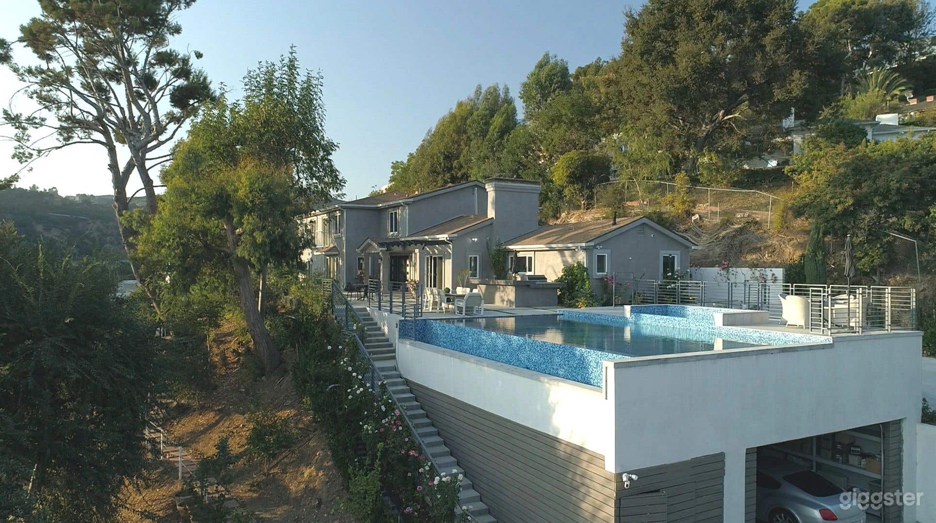 Sprawling Hillside Mansion with Jetliner Views Photo 4