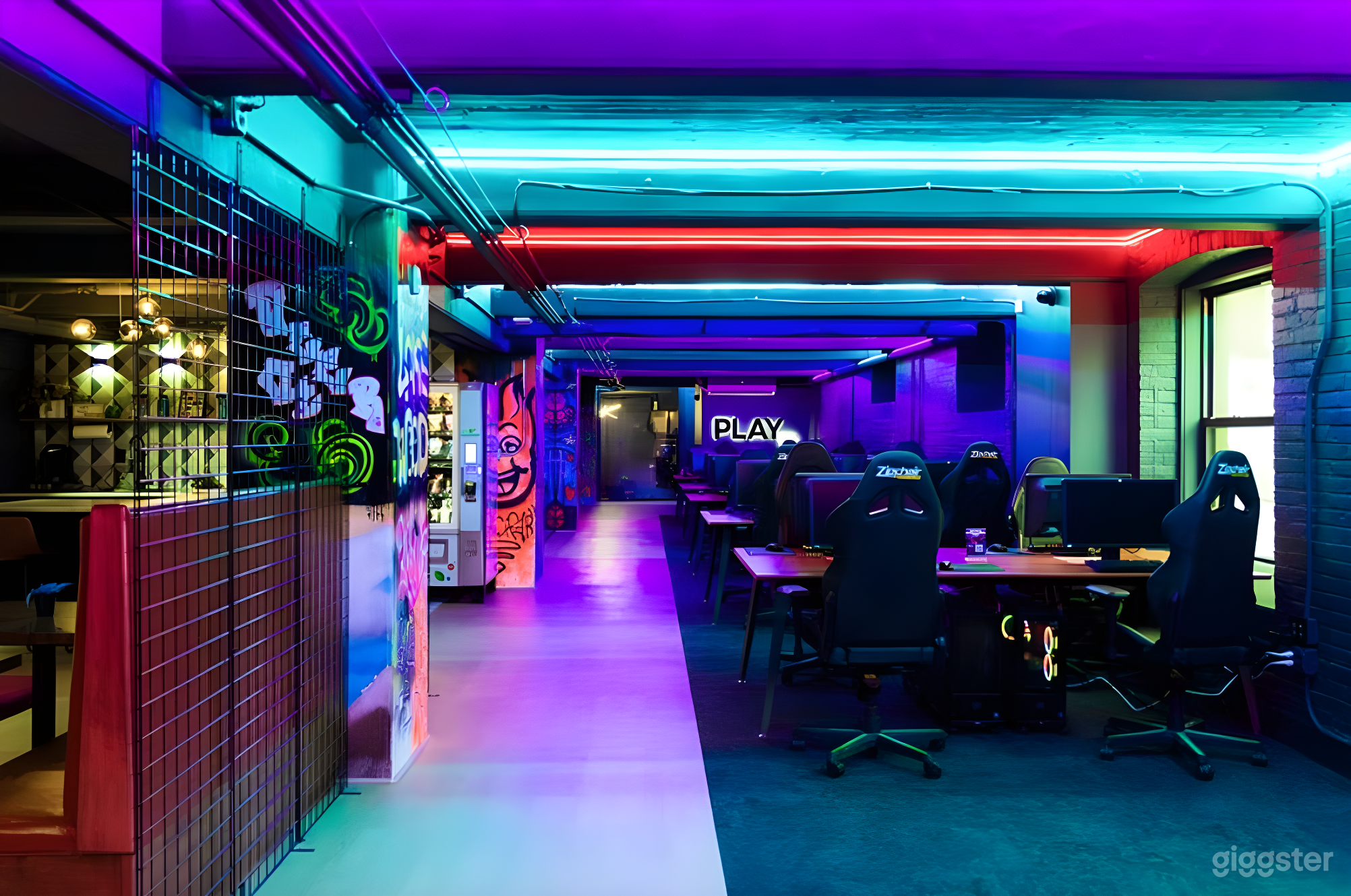 Neon-lit Open Gaming Floor with Pro PCs Photo 3