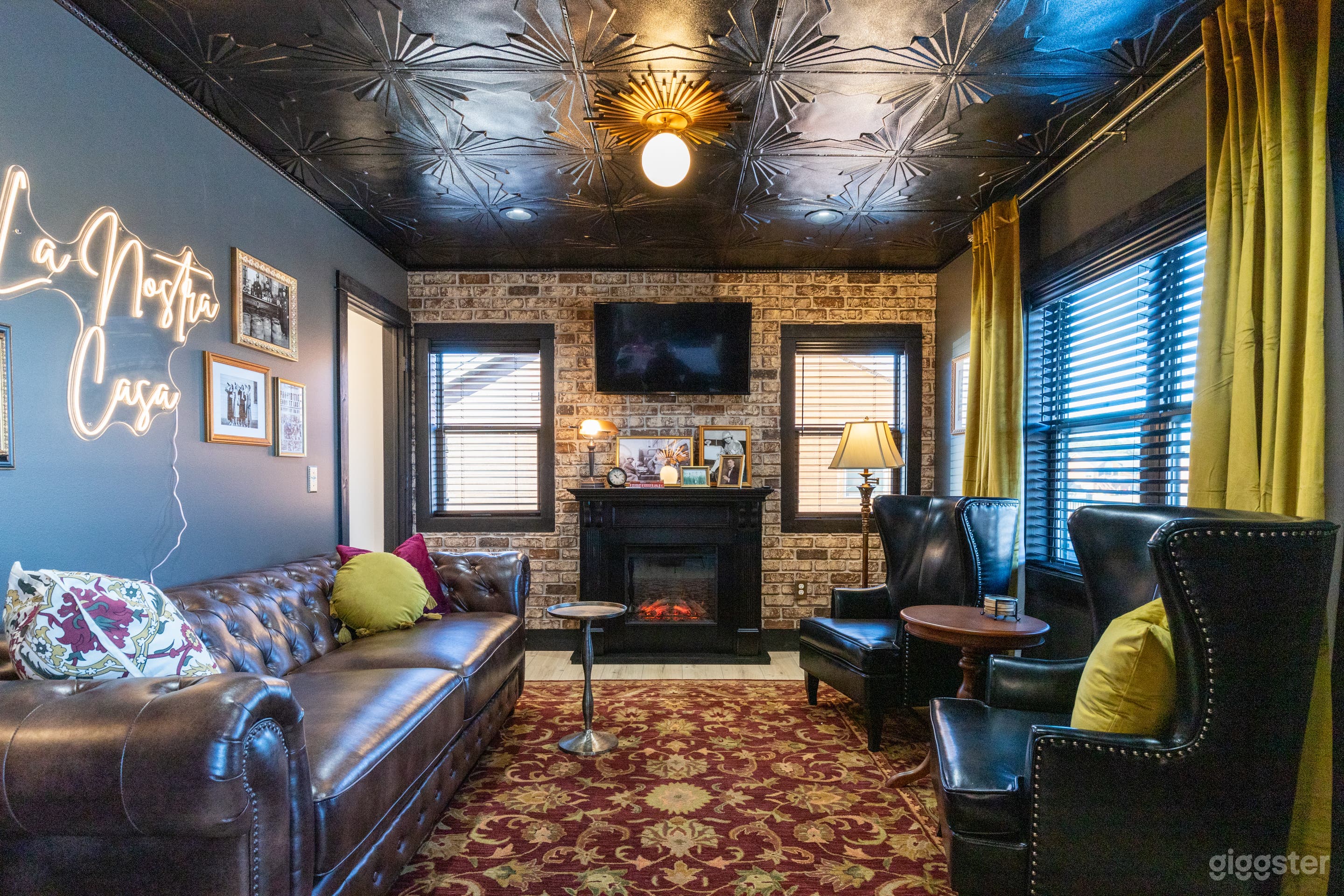 Prohibition themed room with mugshot wall in closet area &amp;  La Nostra Casa neon light (Our Home)