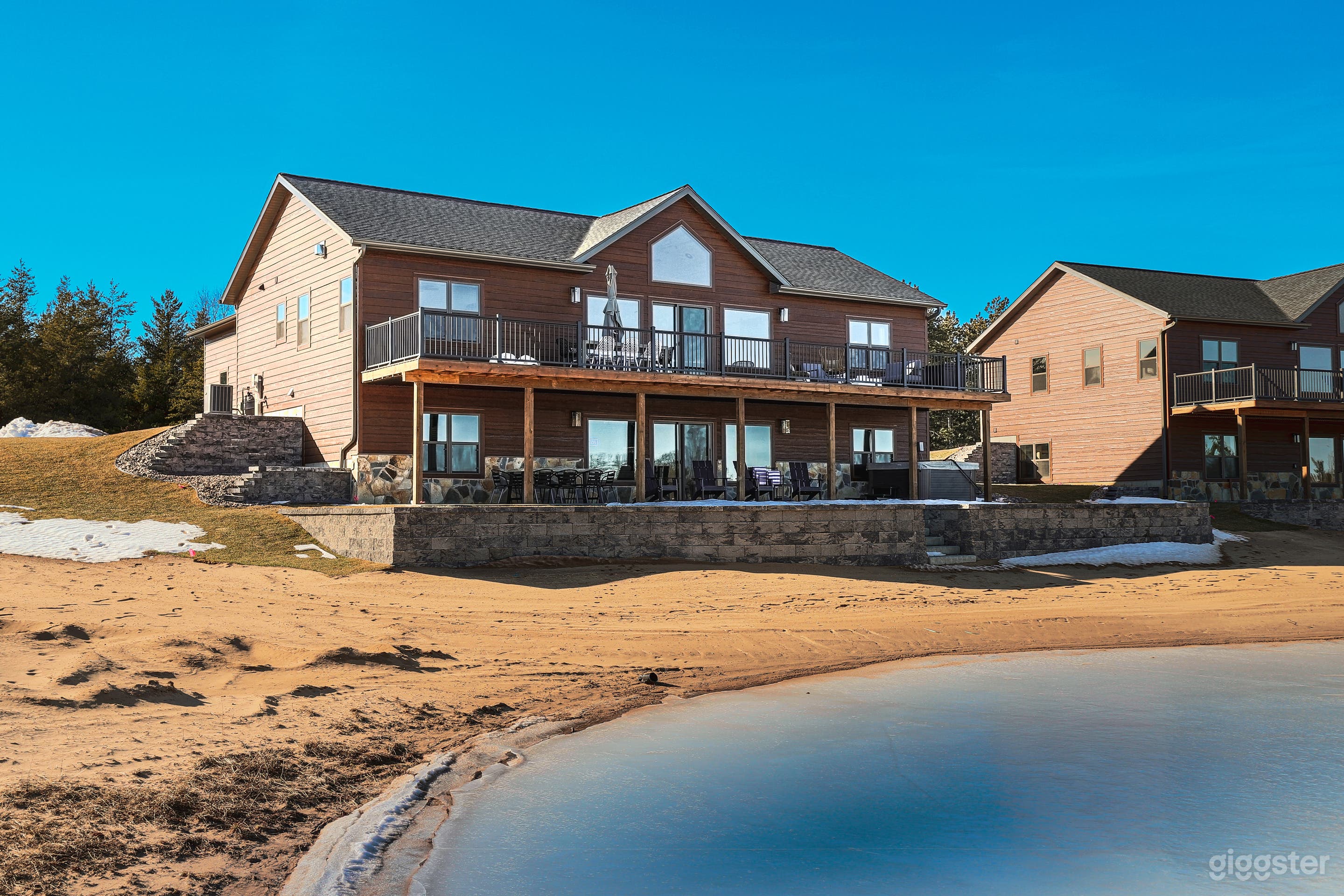 Back of home w/partial of the man made lake