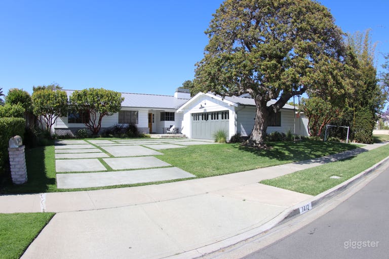  front view of the house, driveway and yard  