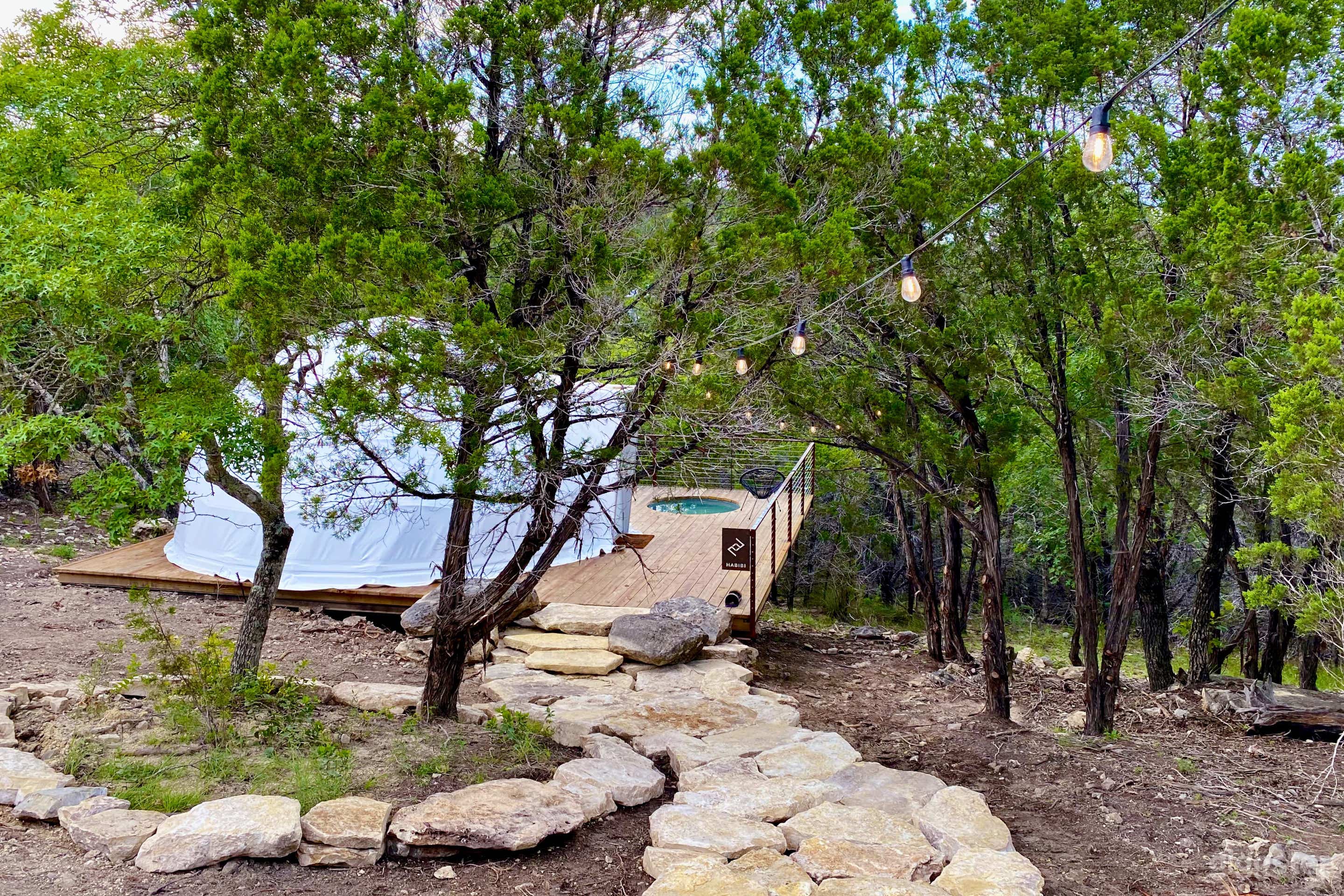 Well lit path leading to the shelter's door and private deck.