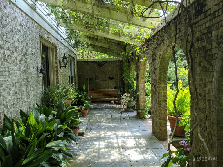  Ivy-covered veranda with brick arches 
